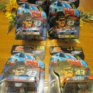 J124-NIB (4) 50th Anniversary Racing Champion Richard Petty Cars 1992,94,95,97